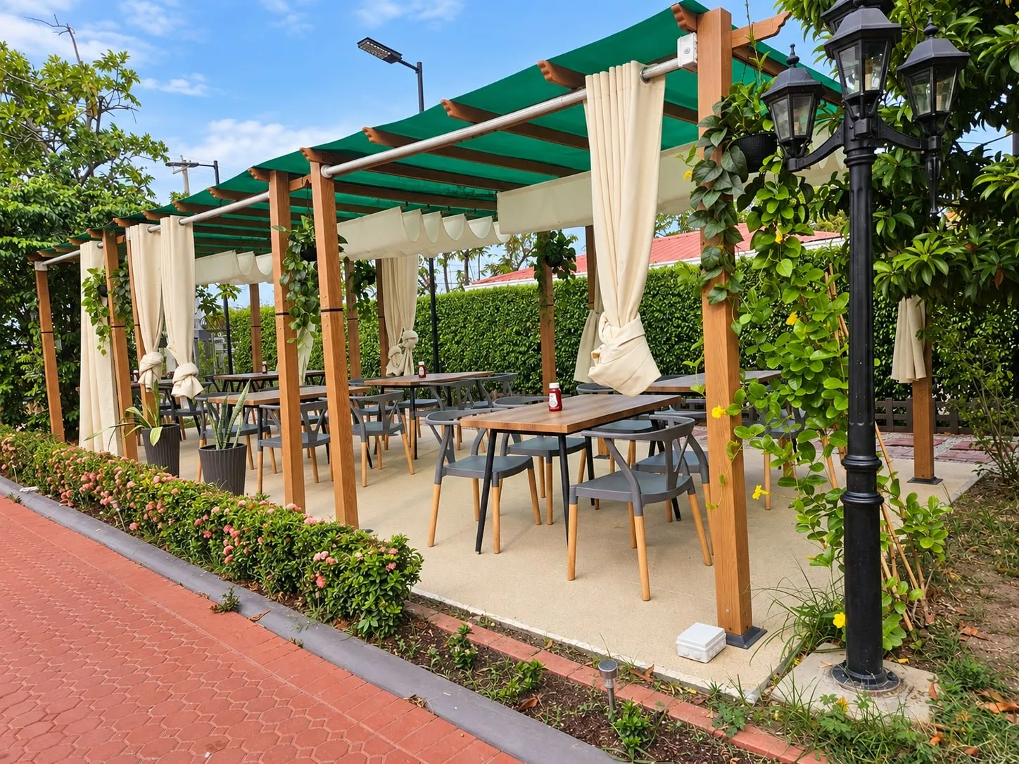 The Patio's outdoor seating beneath a covered patio in Ogle